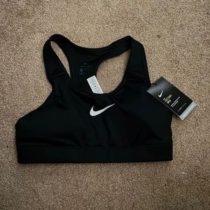 Brand new Nike black sports bra, size medium